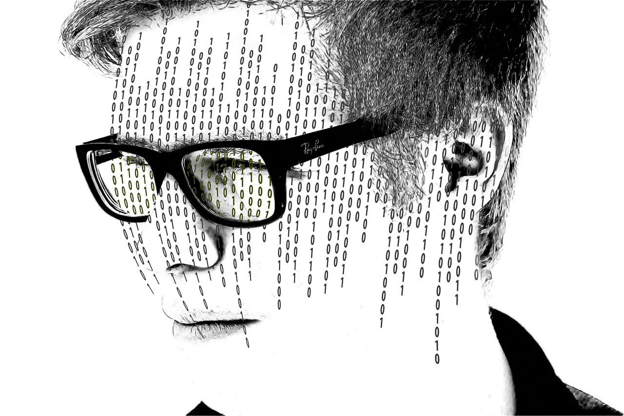 Cabeza humana pensando en código binario